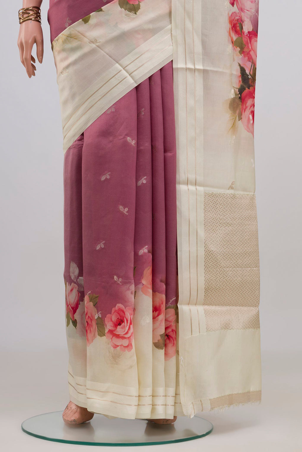 Pleats and pallu of Pink Banarasi Katan Silk Saree with Floral Print on the body and Thin Zari Line. 