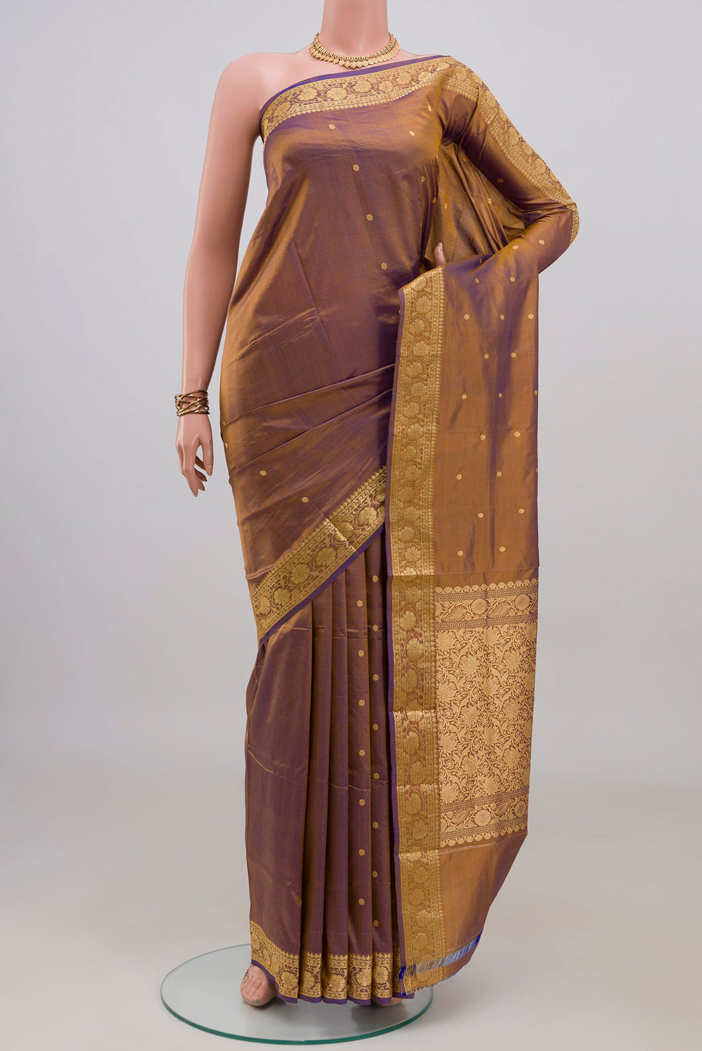 Pure Silk Purple Dual Tone Banarasi Katan Saree with Zari Butta on the body and Zari Border.  displayed on a mannequin