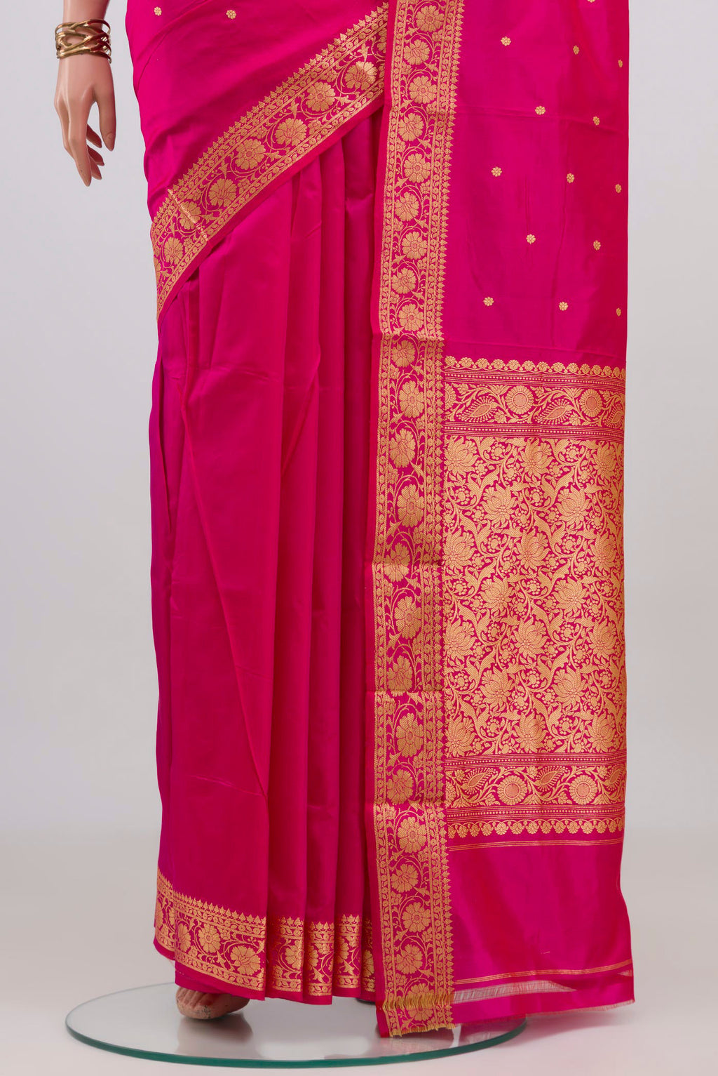 Pleats and pallu of Pink Banarasi Katan Silk Saree with Thread Butta on the body and Thread Border. 