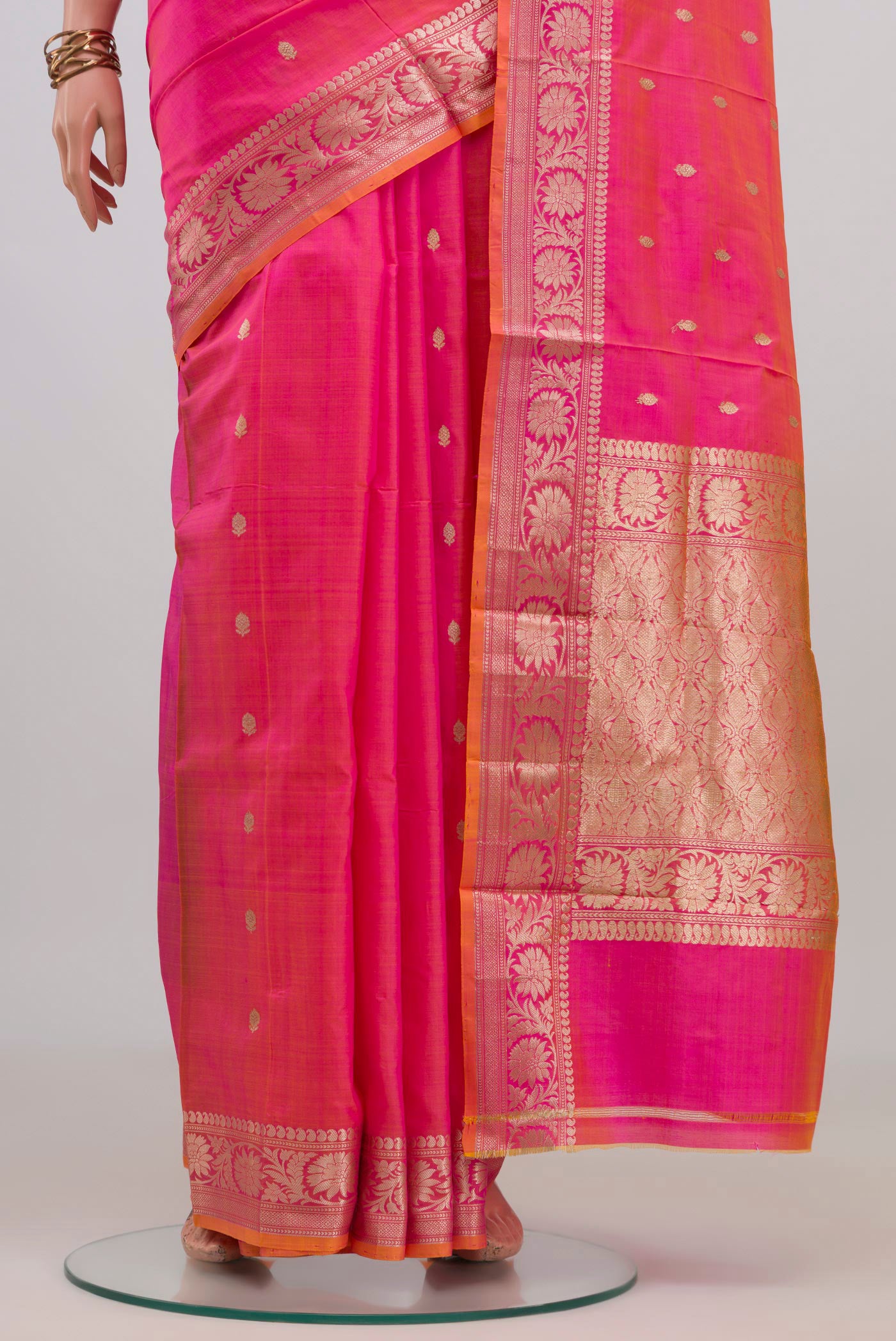 Pleats and pallu of Pink Banarasi Katan Silk Saree with Zari Butta on the body and Zari Border. 