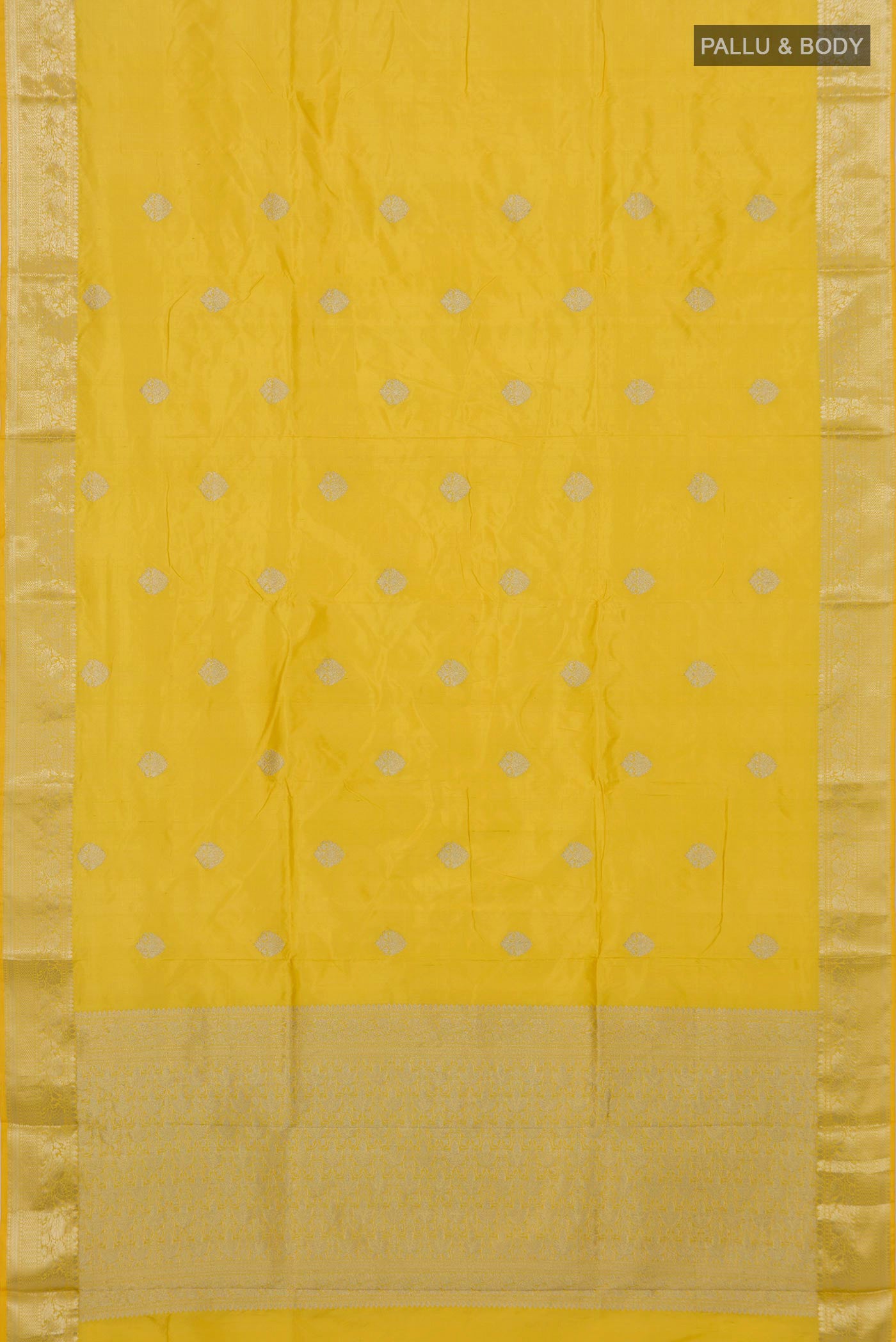 Flat view of Lemon Yellow Banarasi Katan Silk Saree with Zari Butta on the body and Zari Border. 