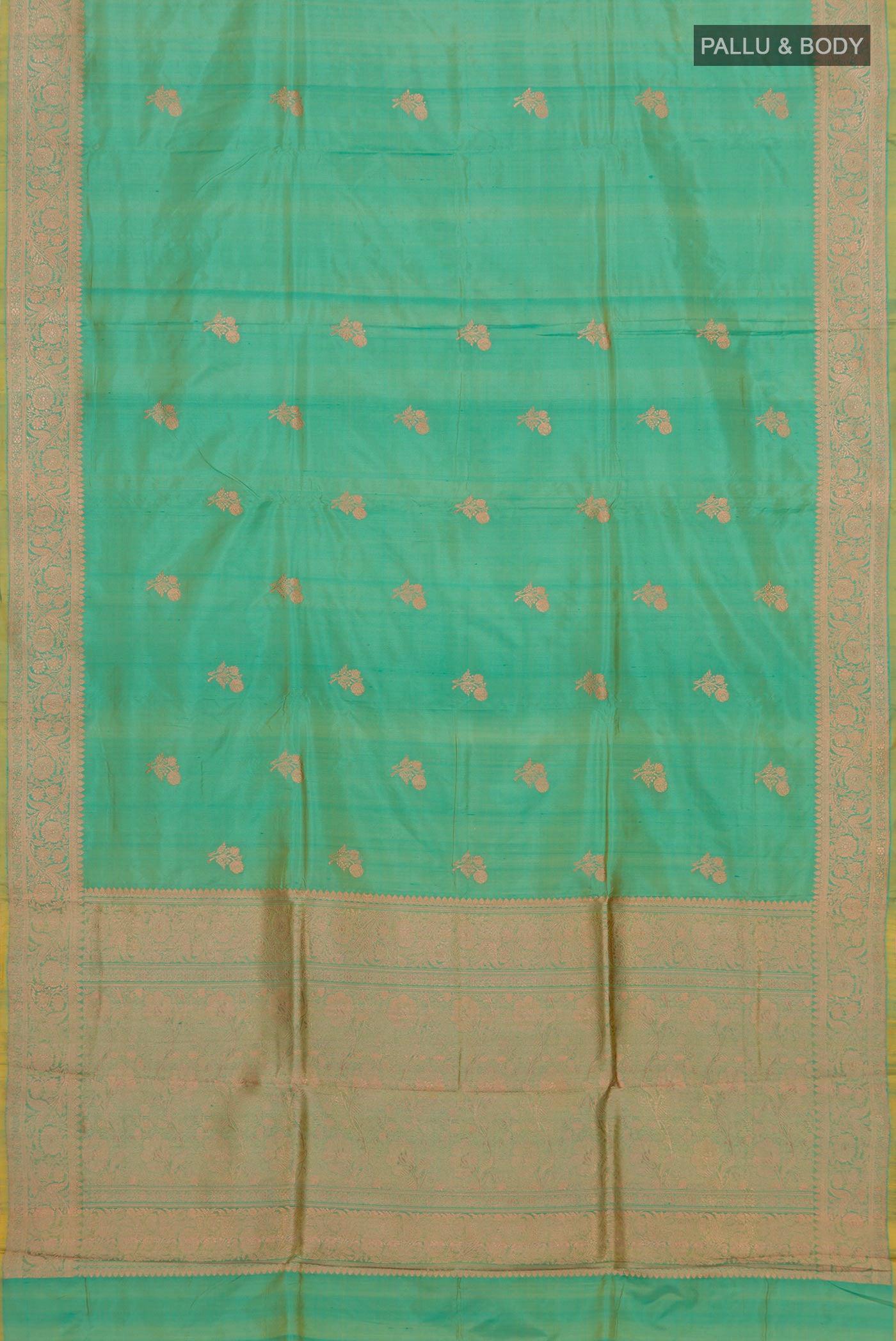 Flat view of Sea Green Banarasi Katan Silk Saree with Zari Butta on the body and Zari Border. 