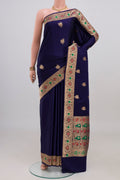 Navy Blue Banarasi Katan Silk Saree with Zari Butta on the body and Zari Border.  displayed on a mannequin