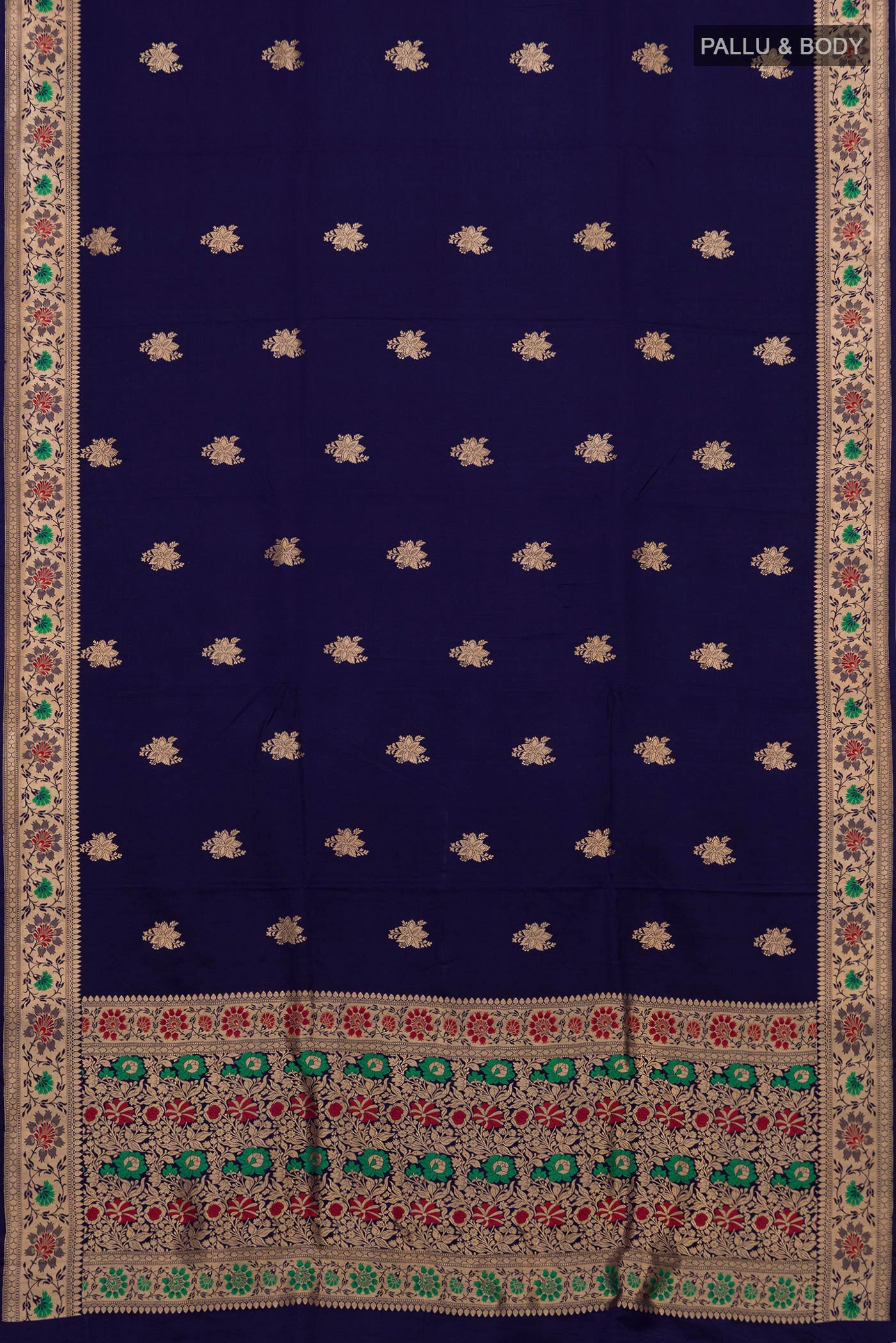 Flat view of Navy Blue Banarasi Katan Silk Saree with Zari Butta on the body and Zari Border. 