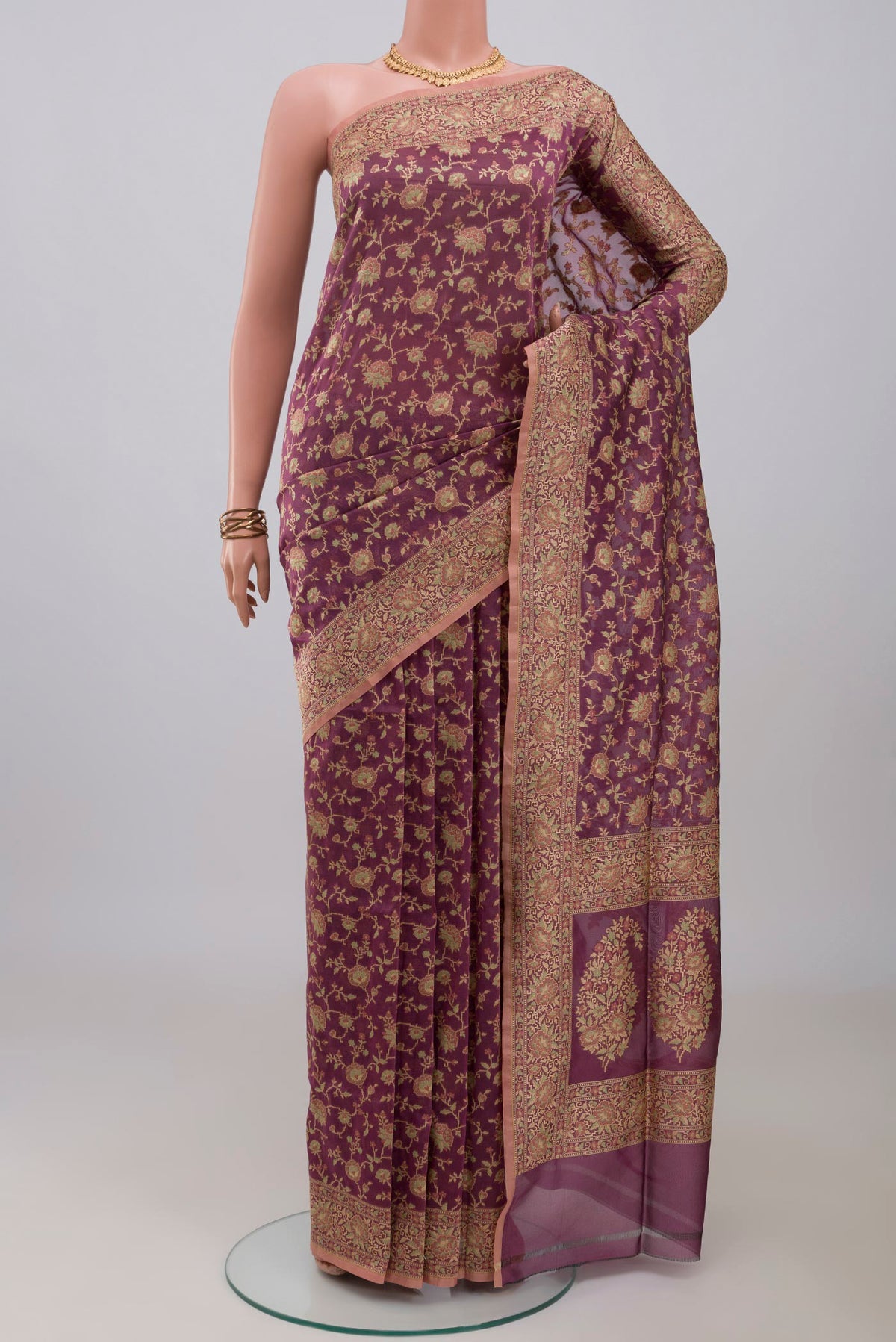 Lavender Banarasi Silk Saree with Thread Butta on the body and Thread Border.  displayed on a mannequin