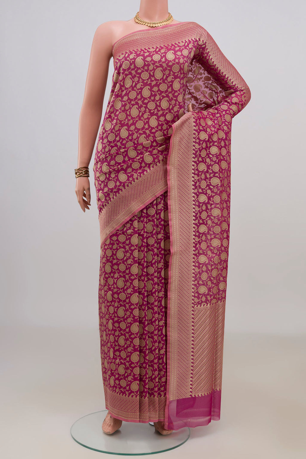 Pure Silk Pink Banarasi Saree with Zari Brocade on the body and Fancy Border.  displayed on a mannequin