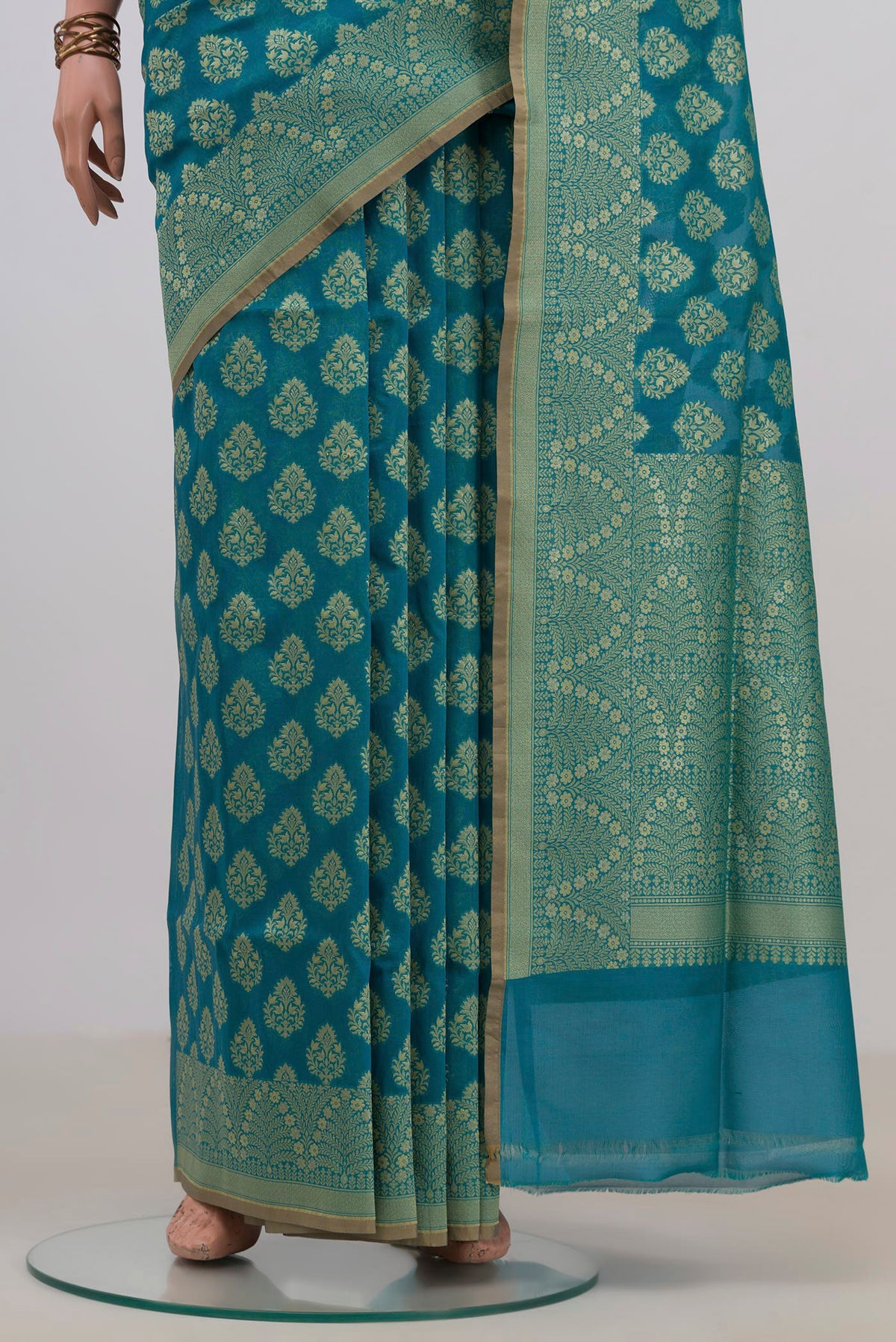 Pleats and pallu of Pure Silk Blue Banarasi Saree with Zari Butta on the body and Fancy Border. 