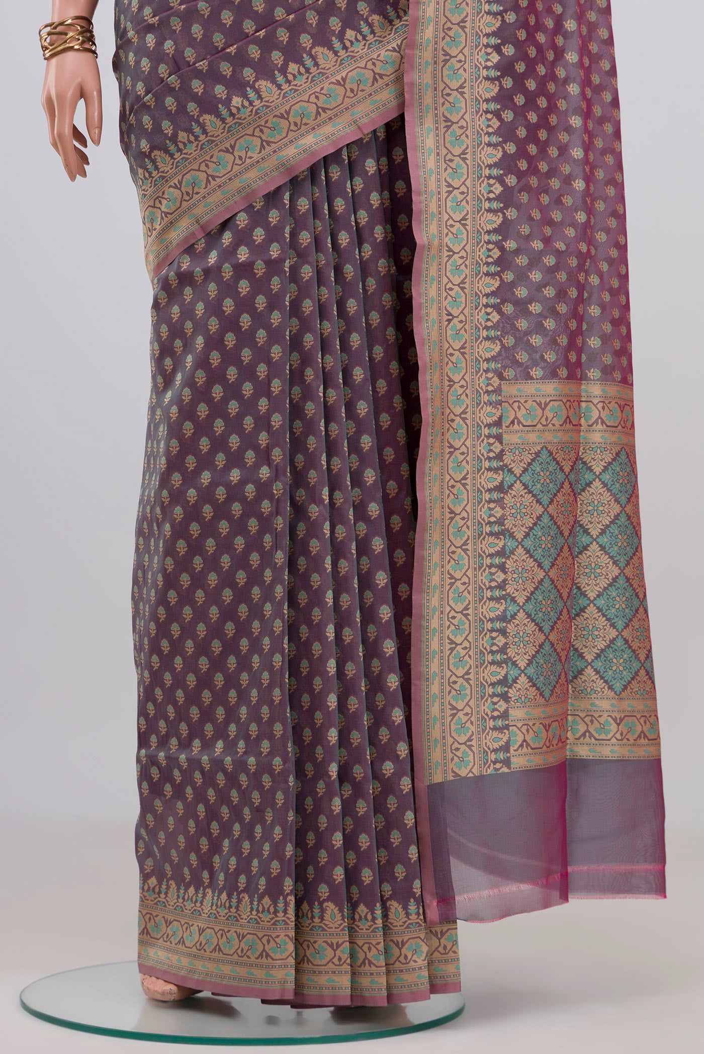 Pleats and pallu of Lavender Banarasi Silk Saree with Zari Butta on the body and Zari Border. 