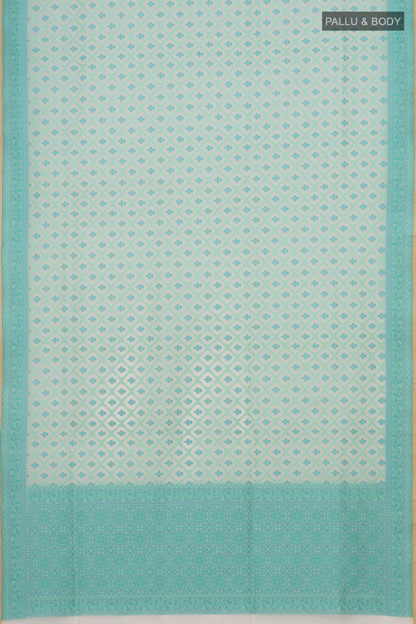 Flat view of Cream Banarasi Silk Saree with Thread Butta on the body and Thread Border. 