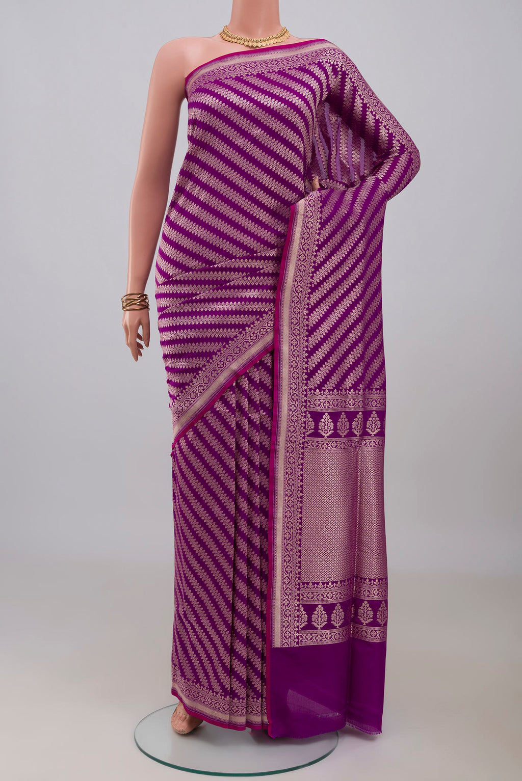 Purple Banarasi Silk Saree with Zari Butta on the body and Zari Border.  displayed on a mannequin