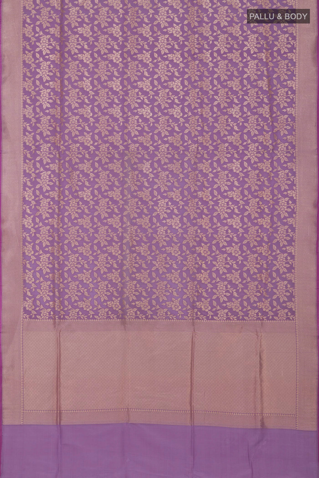 Flat view of Lavender Banarasi Silk Saree with Zari Butta on the body and Zari Border. 