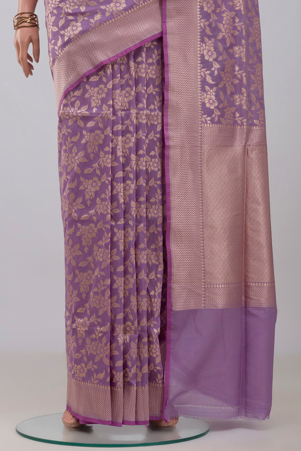 Pleats and pallu of Lavender Banarasi Silk Saree with Zari Butta on the body and Zari Border. 