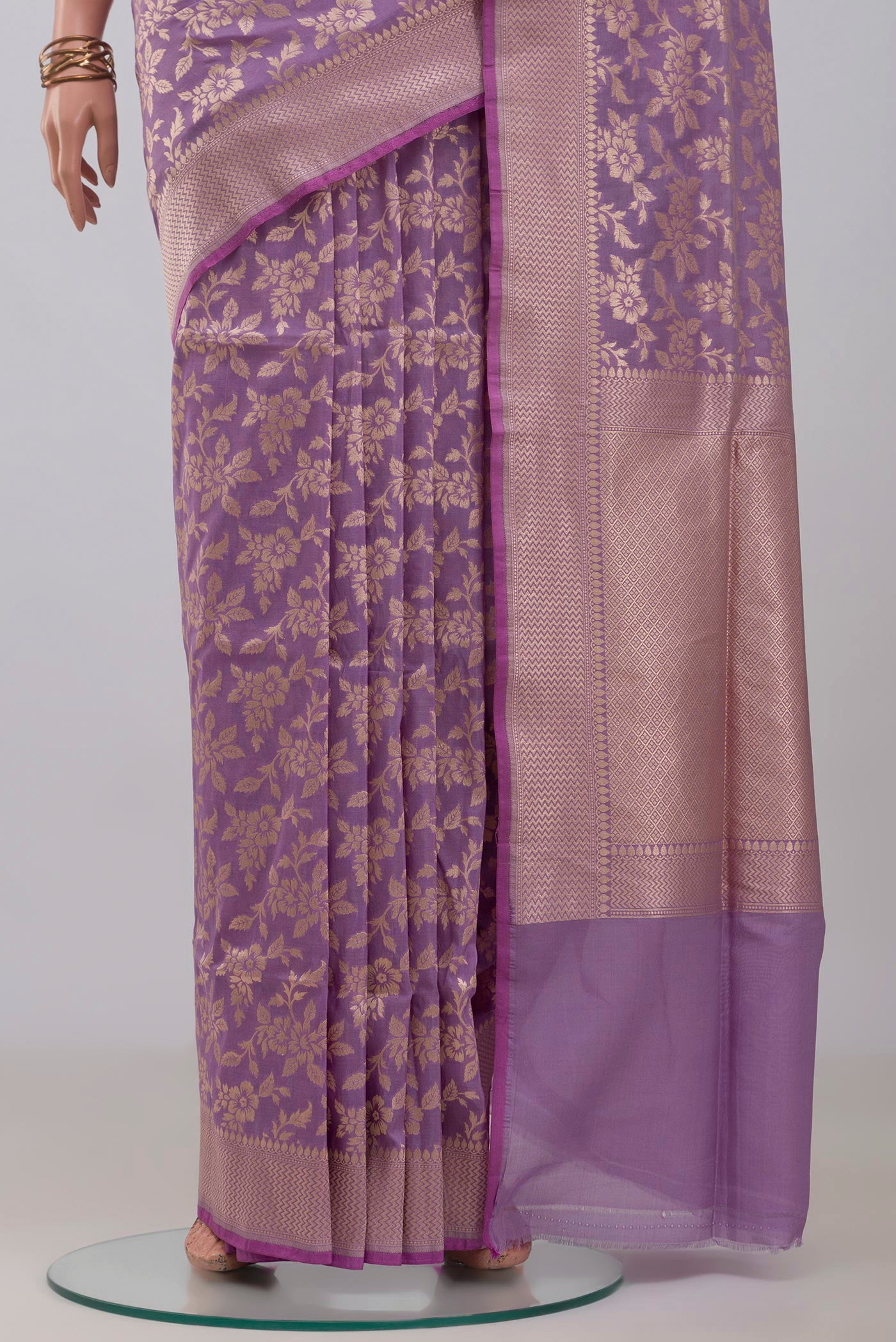 Pleats and pallu of Lavender Banarasi Silk Saree with Zari Butta on the body and Zari Border. 