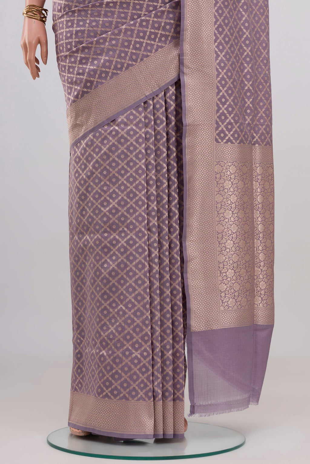 Pleats and pallu of Lavender Banarasi Silk Saree with Zari Brocade on the body and Zari Border. 