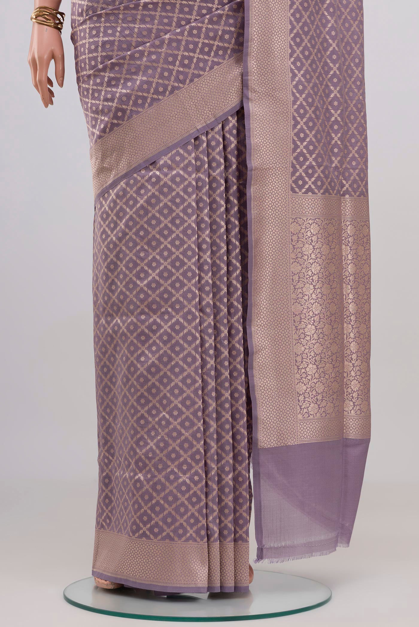 Pleats and pallu of Lavender Banarasi Silk Saree with Zari Brocade on the body and Zari Border. 