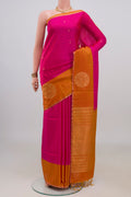 Pure Silk Pink Soft Saree with Zari Butta on the body and Fancy Border.  displayed on a mannequin