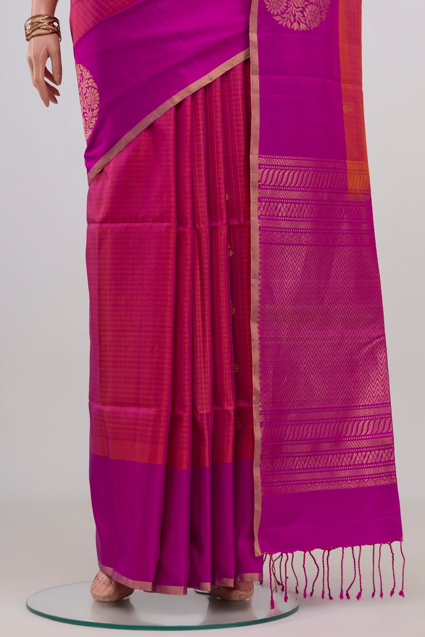Pleats and pallu of Pink Soft Silk Saree with Checked design on the body and Fancy Border. 