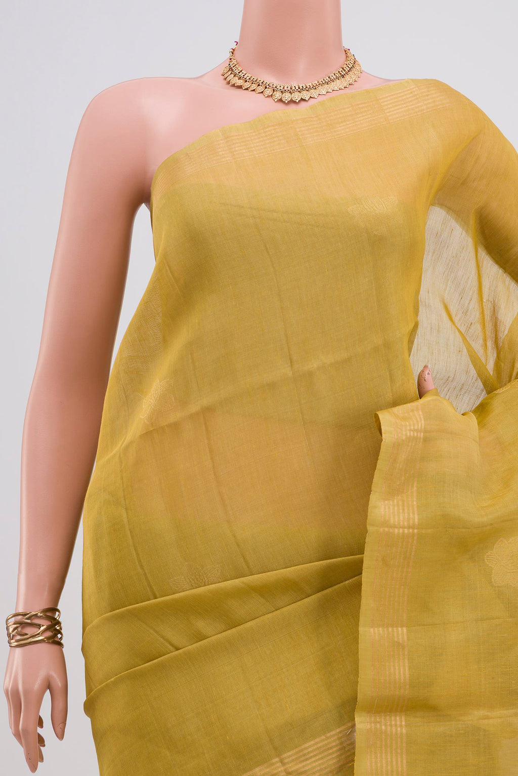 Border image of Green Soft Silk Saree with Zari Butta on the body and Thin Zari Line. 