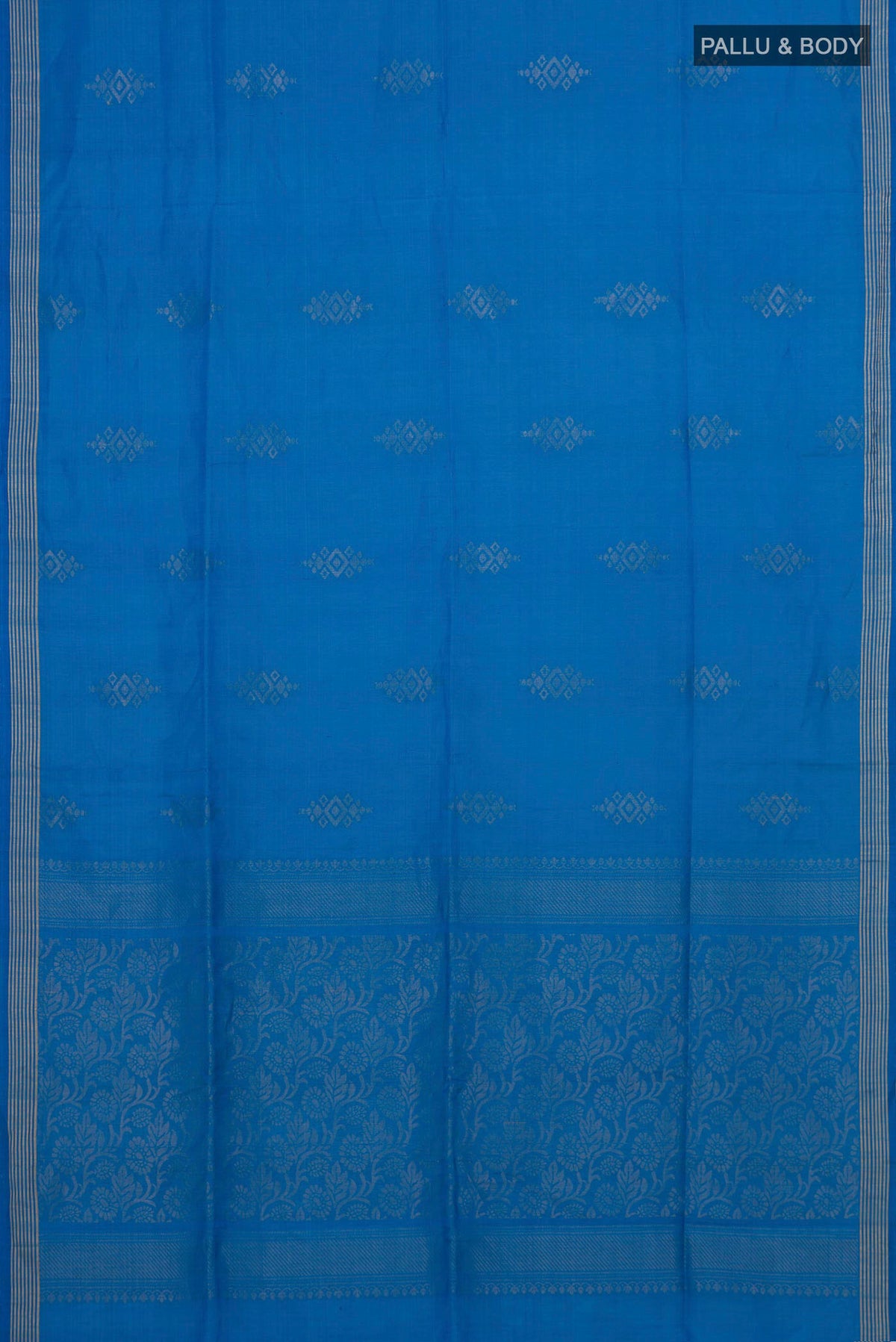 Flat view of Pure Silk Blue Soft Saree with Zari Butta on the body and Thin Zari Line. 