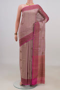 Pure Silk Lavender Banarasi Tussar Saree with Zari Butta on the body and Fancy Border.  displayed on a mannequin