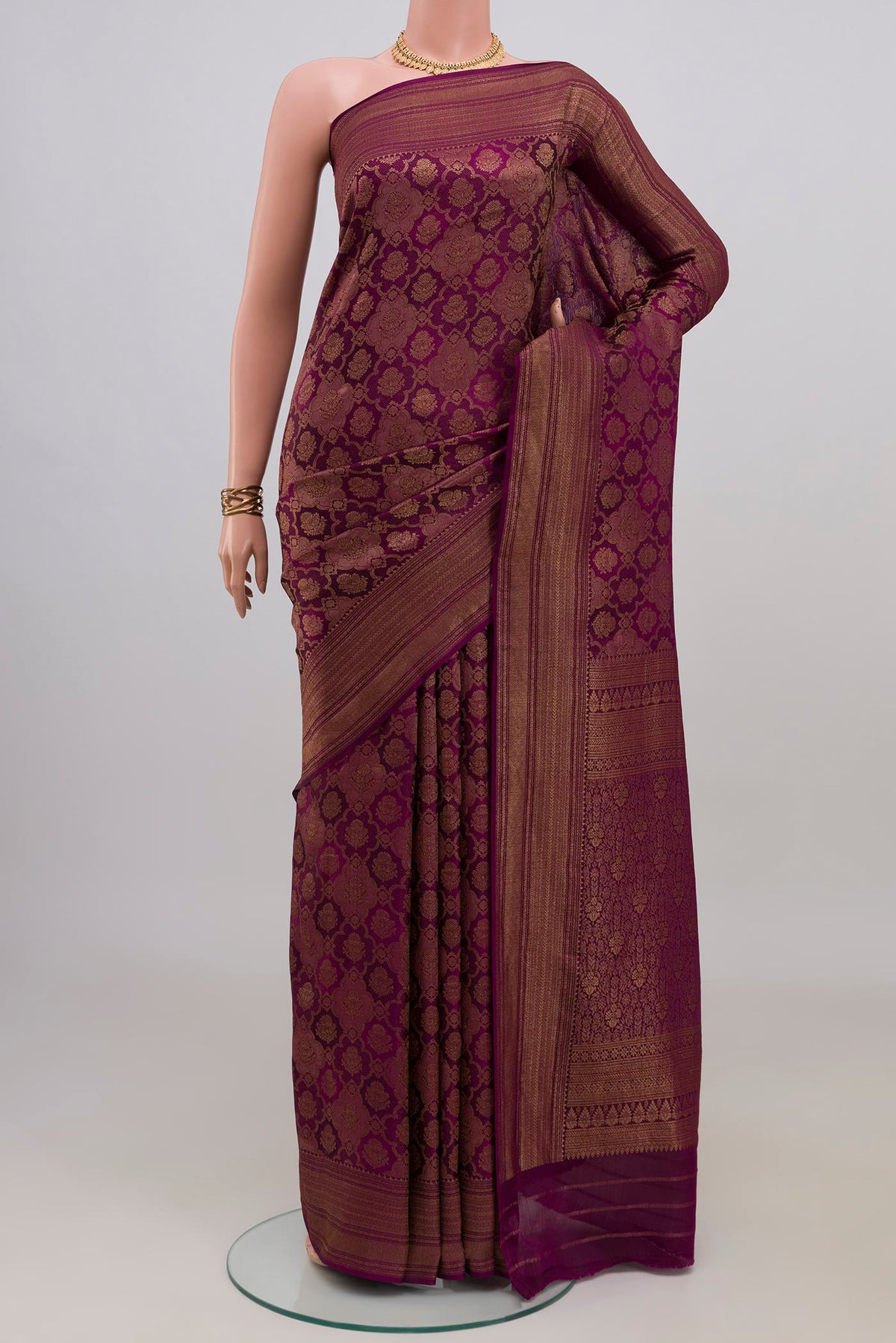 Purple Mysore Crepe Saree with Zari Brocade on the body and Zari Border.  displayed on a mannequin