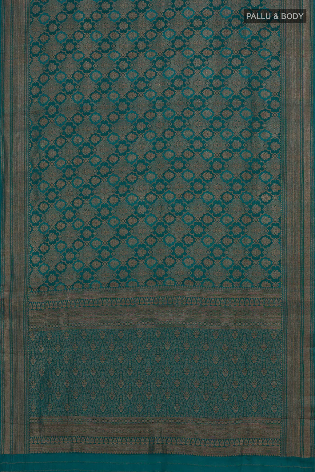 Flat view of Teal Crepe Saree with Zari Brocade on the body and Zari Border. 