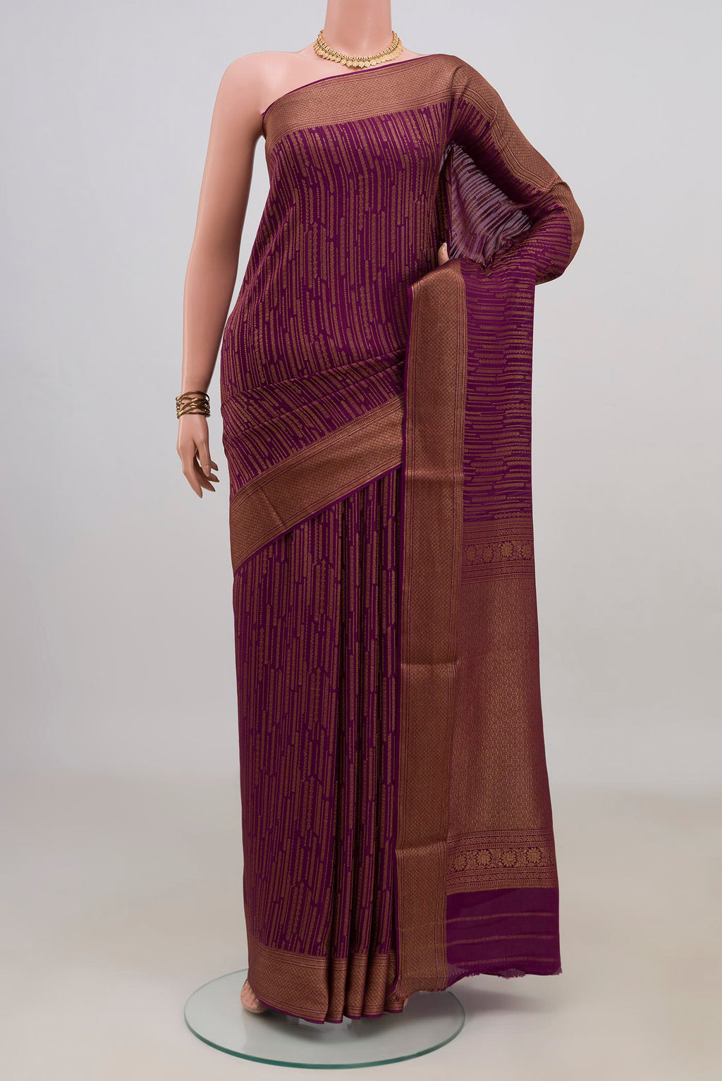 Purple Mysore Crepe Saree with Stripes on the body and Zari Border.  displayed on a mannequin