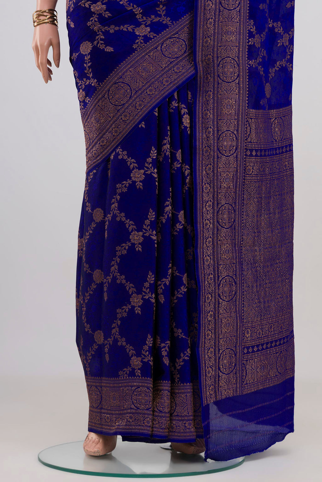 Pleats and pallu of Royal Blue Crepe Saree with Zari Brocade on the body and Fancy Border. 