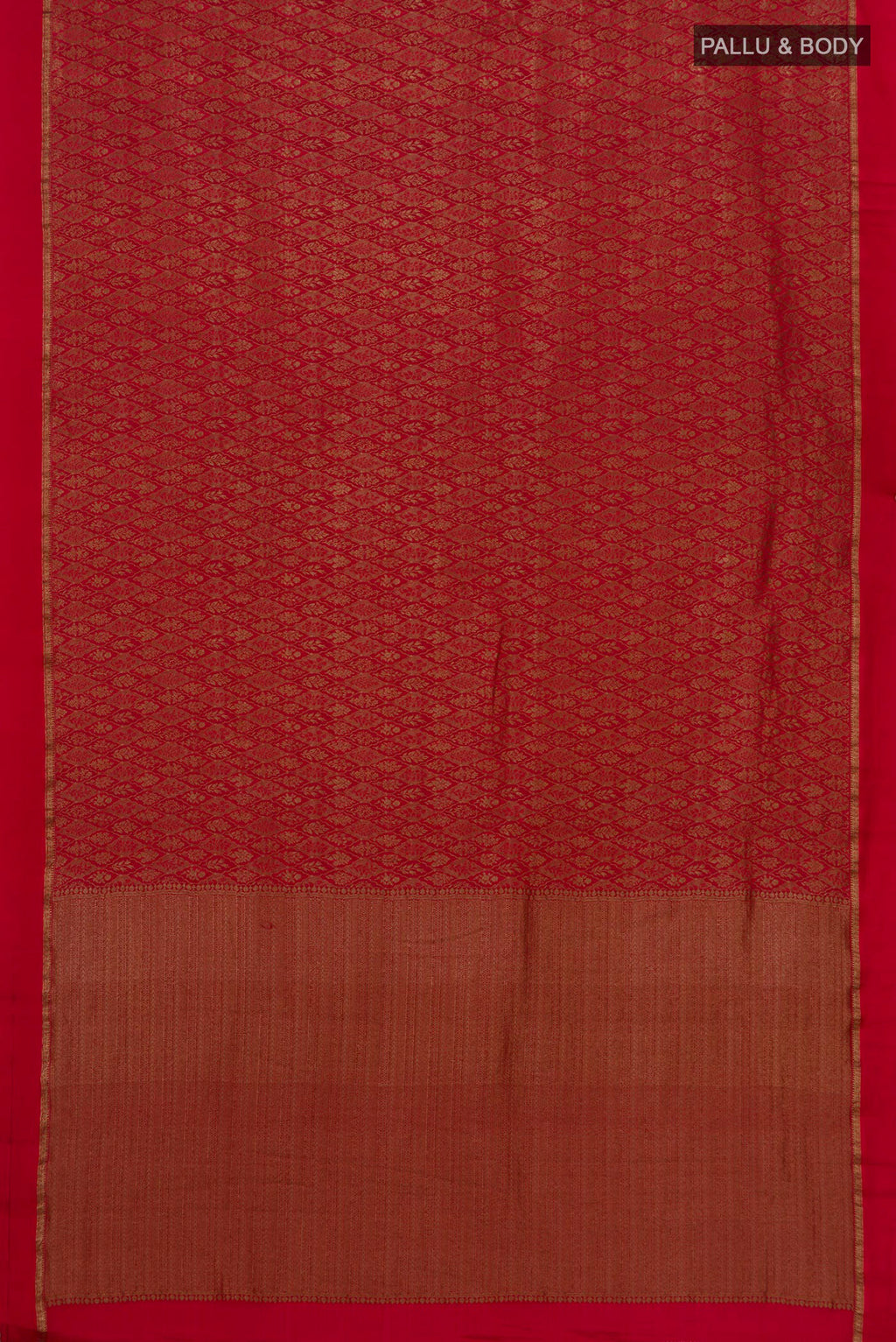 Flat view of Red Crepe Saree with Zari Brocade on the body and Thin Zari Line. 