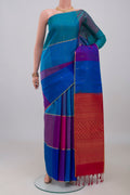 Multi Color Soft Silk Saree with Zari Butta on the body and Thin Zari Line.  displayed on a mannequin