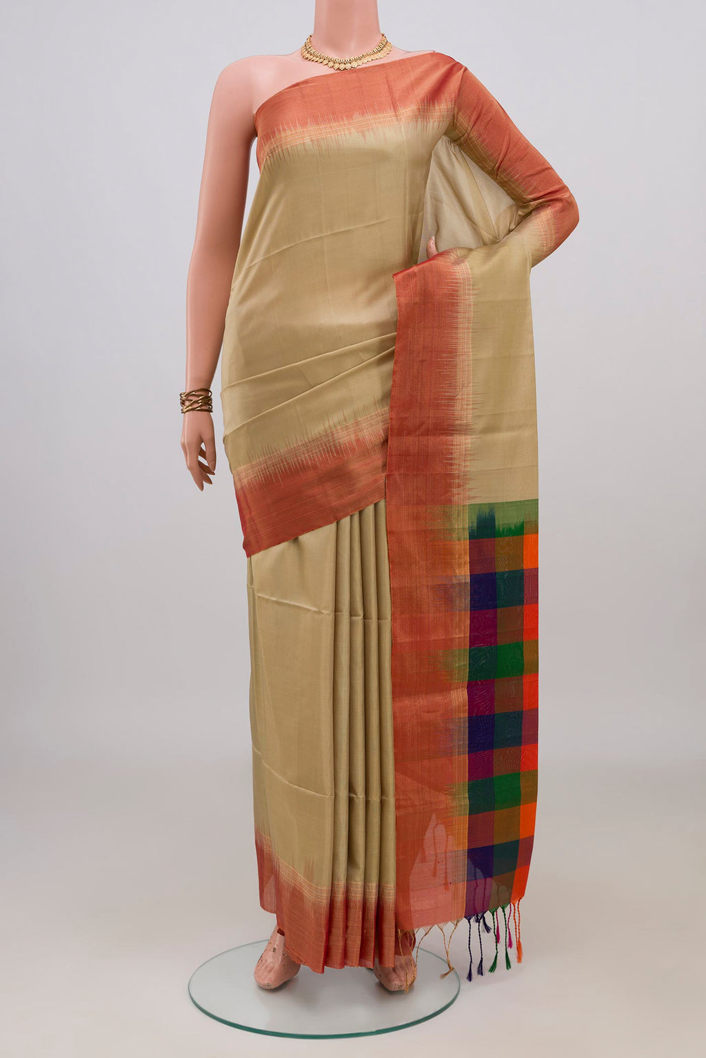 Pure Silk Beige Soft Saree with Plain Body and Zari Border.  displayed on a mannequin