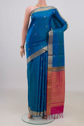 Pure Silk Blue Soft Saree with Zari Butta on the body and Zari Border.  displayed on a mannequin