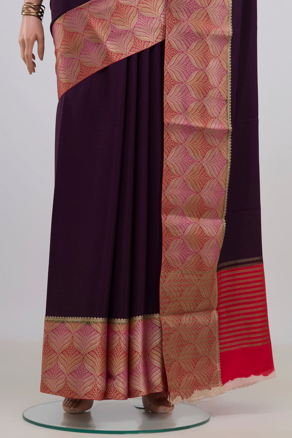 Pleats and pallu of Purple Mysore Crepe Saree with Plain Body and Fancy Border. 
