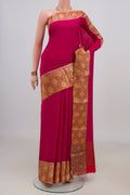 Pink Mysore Crepe Saree with Plain Body and Fancy Border.  displayed on a mannequin