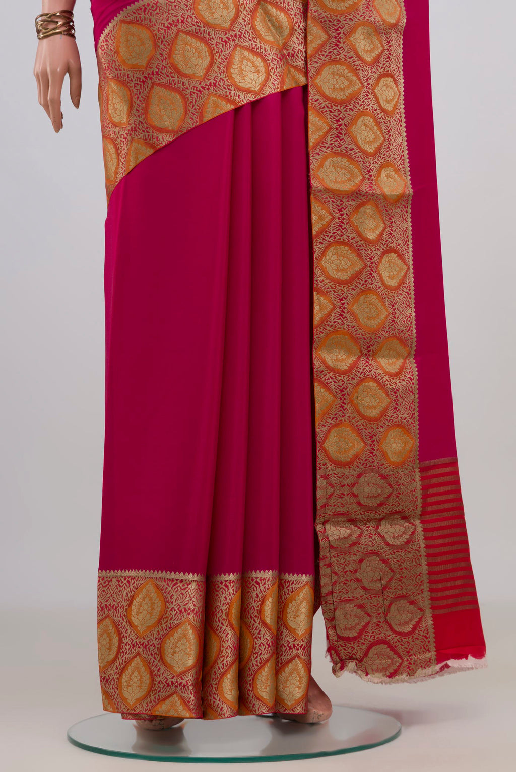Pleats and pallu of Pink Mysore Crepe Saree with Plain Body and Fancy Border. 