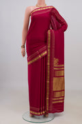 Dark Pink Mysore Crepe Saree with Plain Body and Fancy Border.  displayed on a mannequin