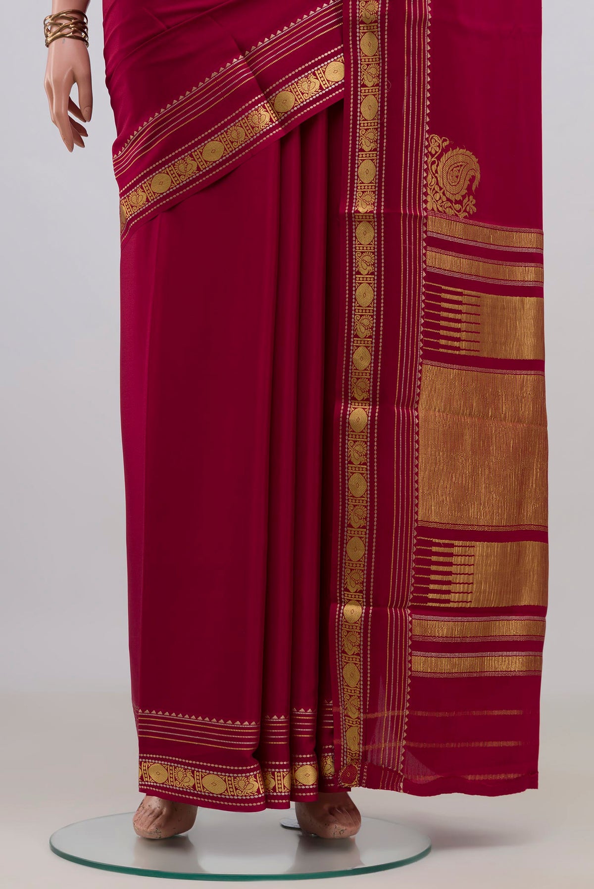 Pleats and pallu of Dark Pink Mysore Crepe Saree with Plain Body and Fancy Border. 