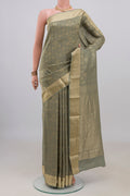 Sage Green Mysore Crepe Saree with Zari Brocade on the body and Zari Border.  displayed on a mannequin