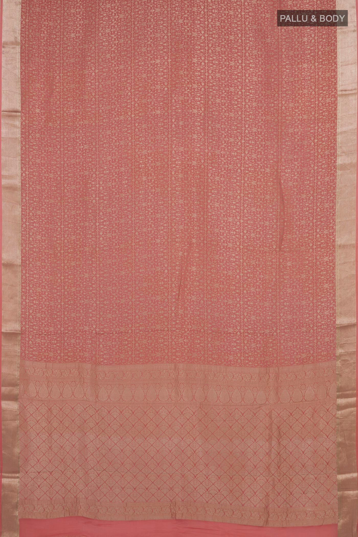 Flat view of Peach Mysore Crepe Saree with Zari Brocade on the body and Zari Border. 
