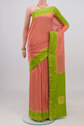 Peach Bangalore Silk Saree with Plain Body and Thin Zari Line.  displayed on a mannequin