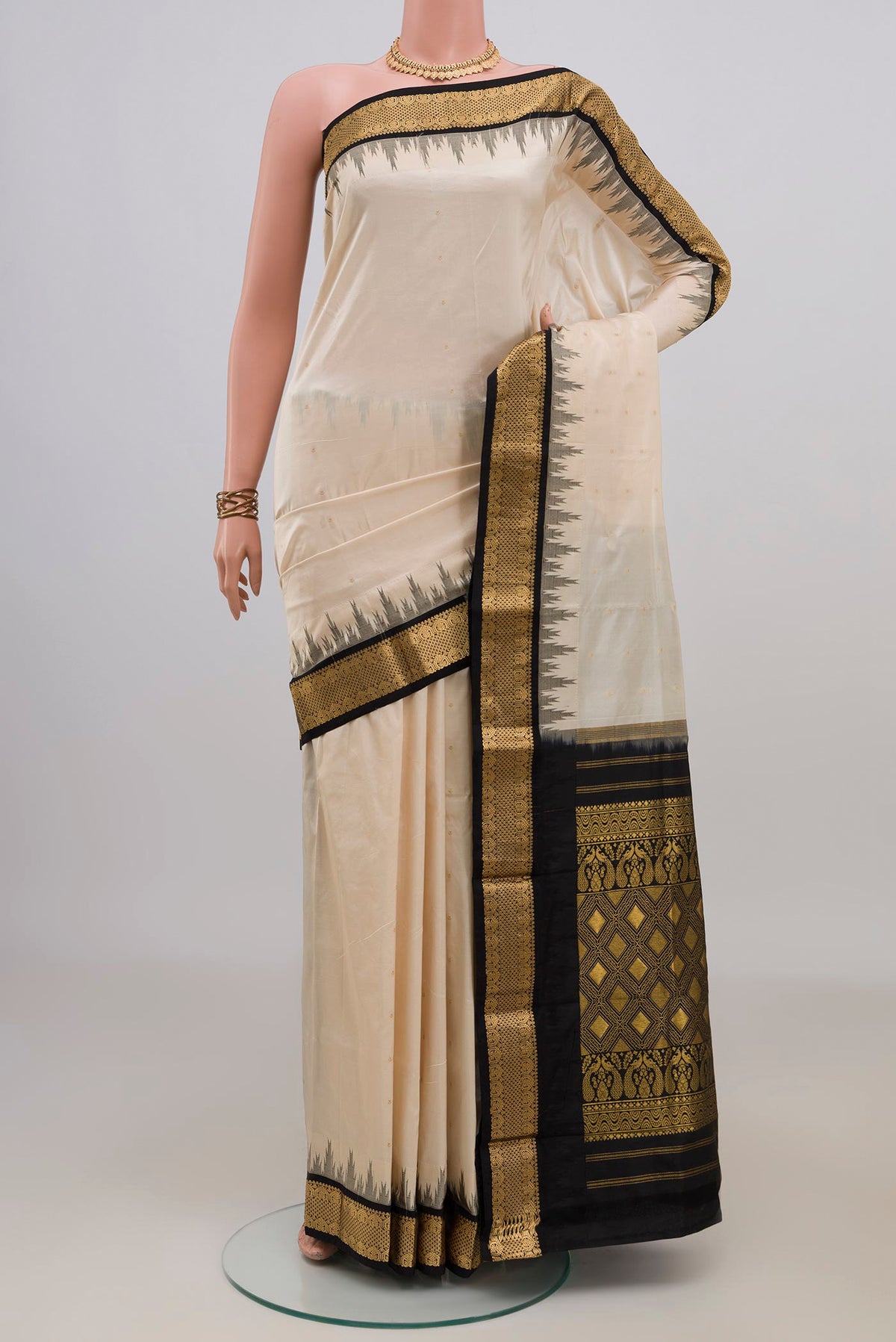 Pure Silk Cream Bangalore Saree with Zari Butta on the body and Zari Border.  displayed on a mannequin