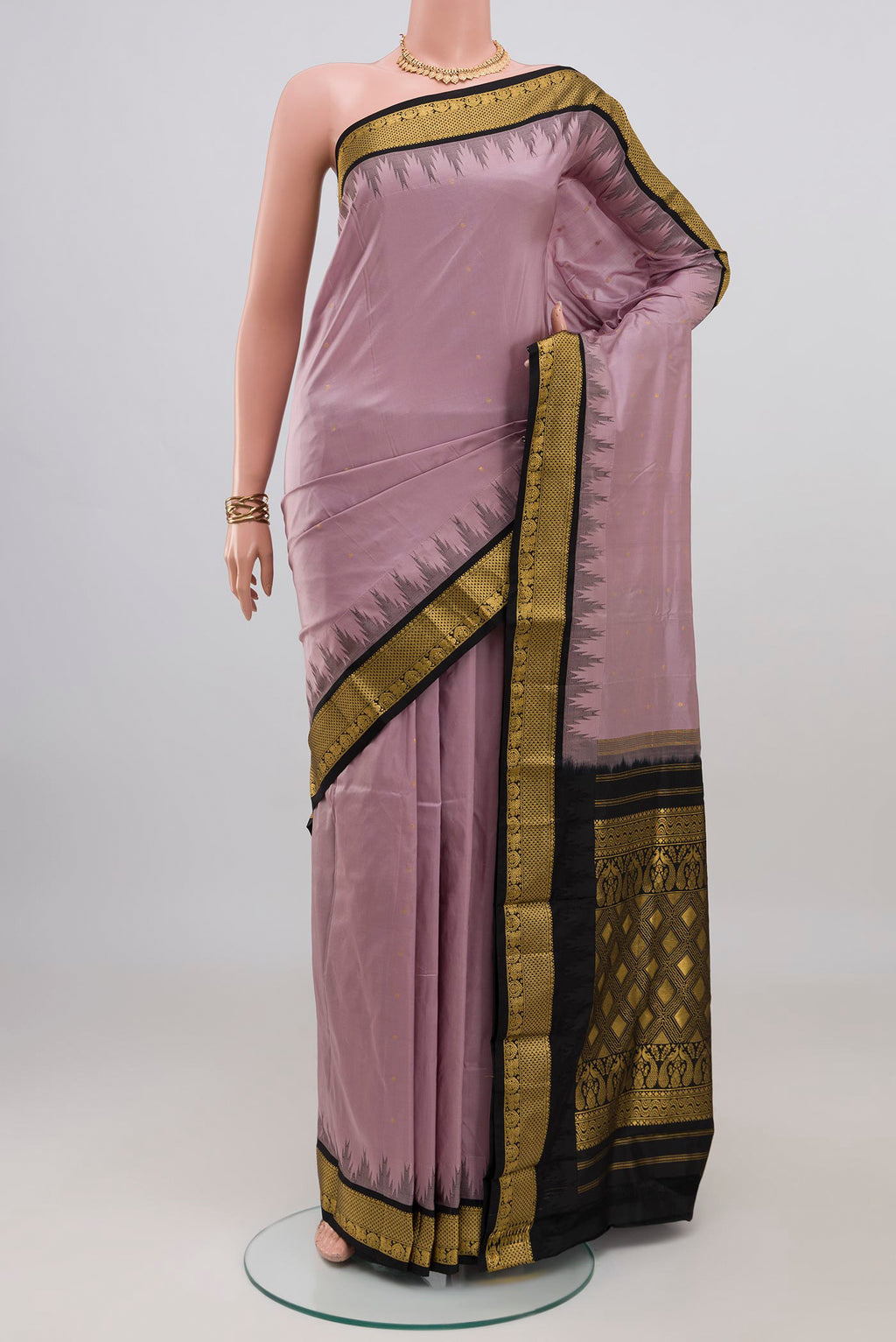 Lavender Bangalore Silk Saree with Zari Butta on the body and Zari Border.  displayed on a mannequin