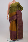 Pure Silk Pure Zari Mustard Kanjivaram Saree with Checked design on the body and Ganga Jamuna Border.  displayed on a mannequin