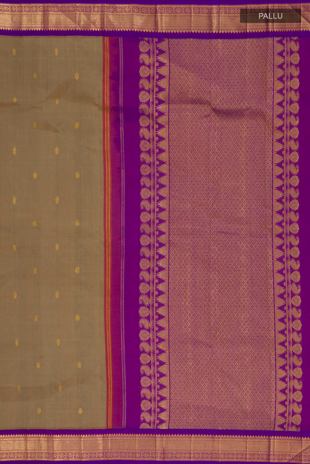 Close up image of the pallu of Pure Silk Beige Kanchipuram Saree with Zari Butta on the body and Zari Border. 