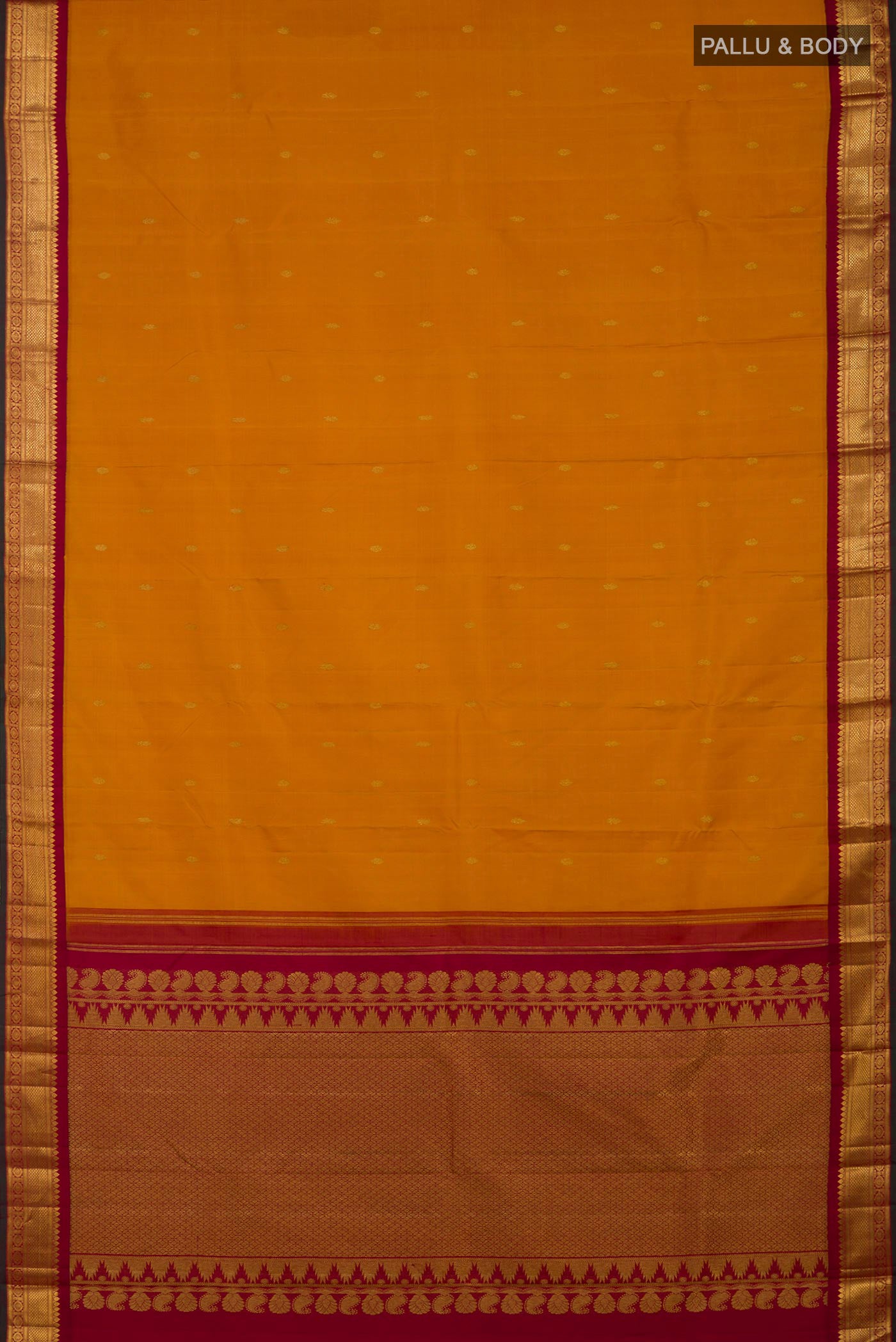 Flat view of Yellow Kanchipuram Silk Saree with Zari Butta on the body and Zari Border. 