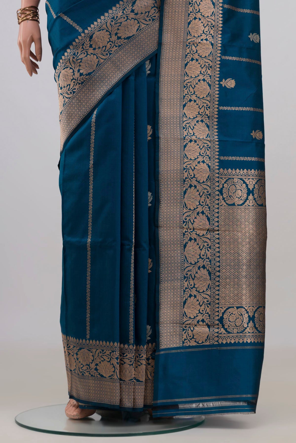 Pleats and pallu of Pure Silk Blue Banarasi Katan Saree with Zari Butta on the body and Zari Border. 