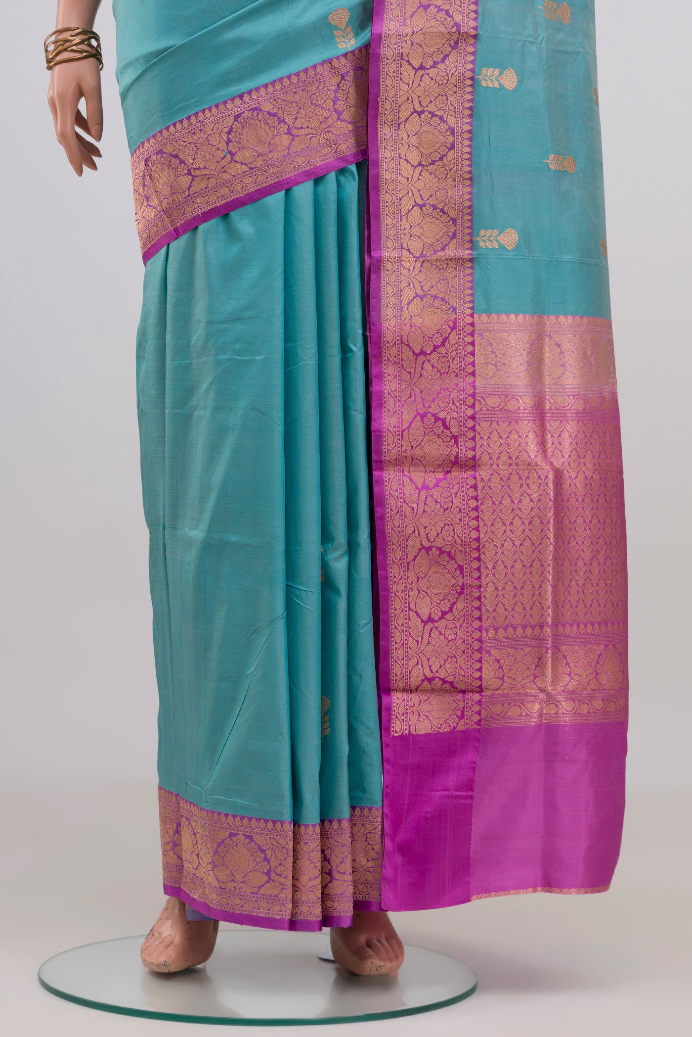 Pleats and pallu of Light Blue Banarasi Katan Silk Saree with Zari Butta on the body and Fancy Border. 