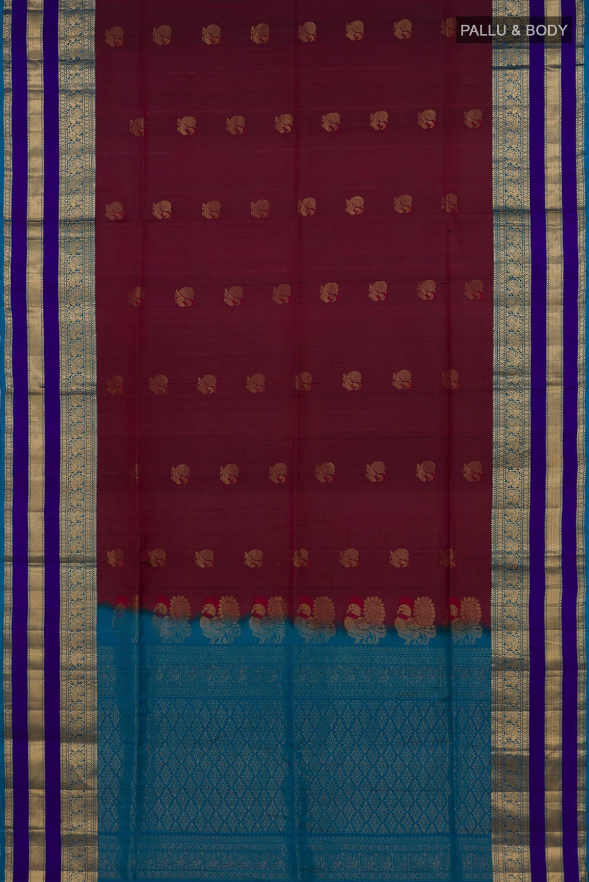 Flat view of Pure Silk Maroon Soft Saree with Zari Butta on the body and Zari Border. 