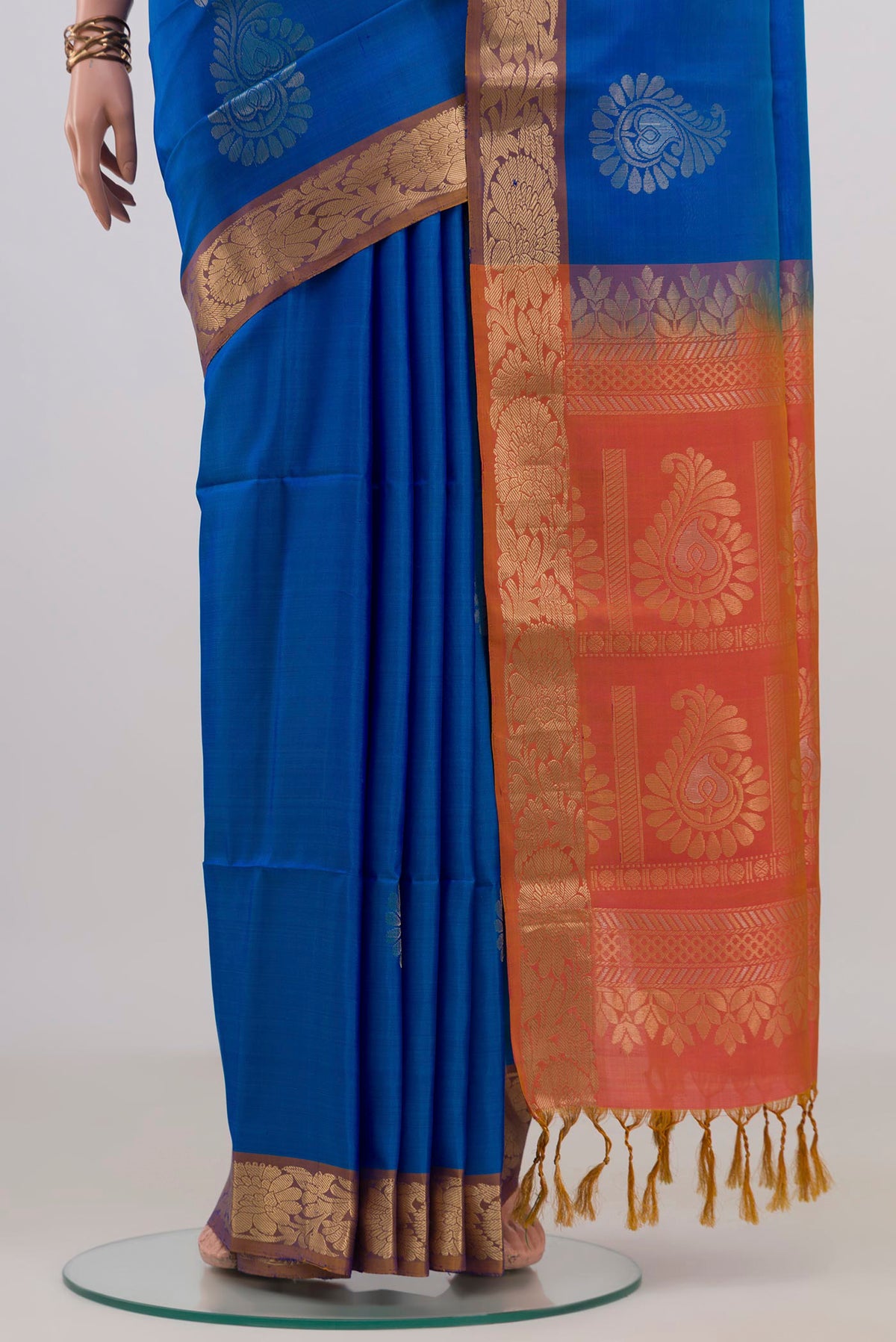 Pleats and pallu of Pure Silk Blue Soft Saree with Zari Butta on the body and Zari Border. 