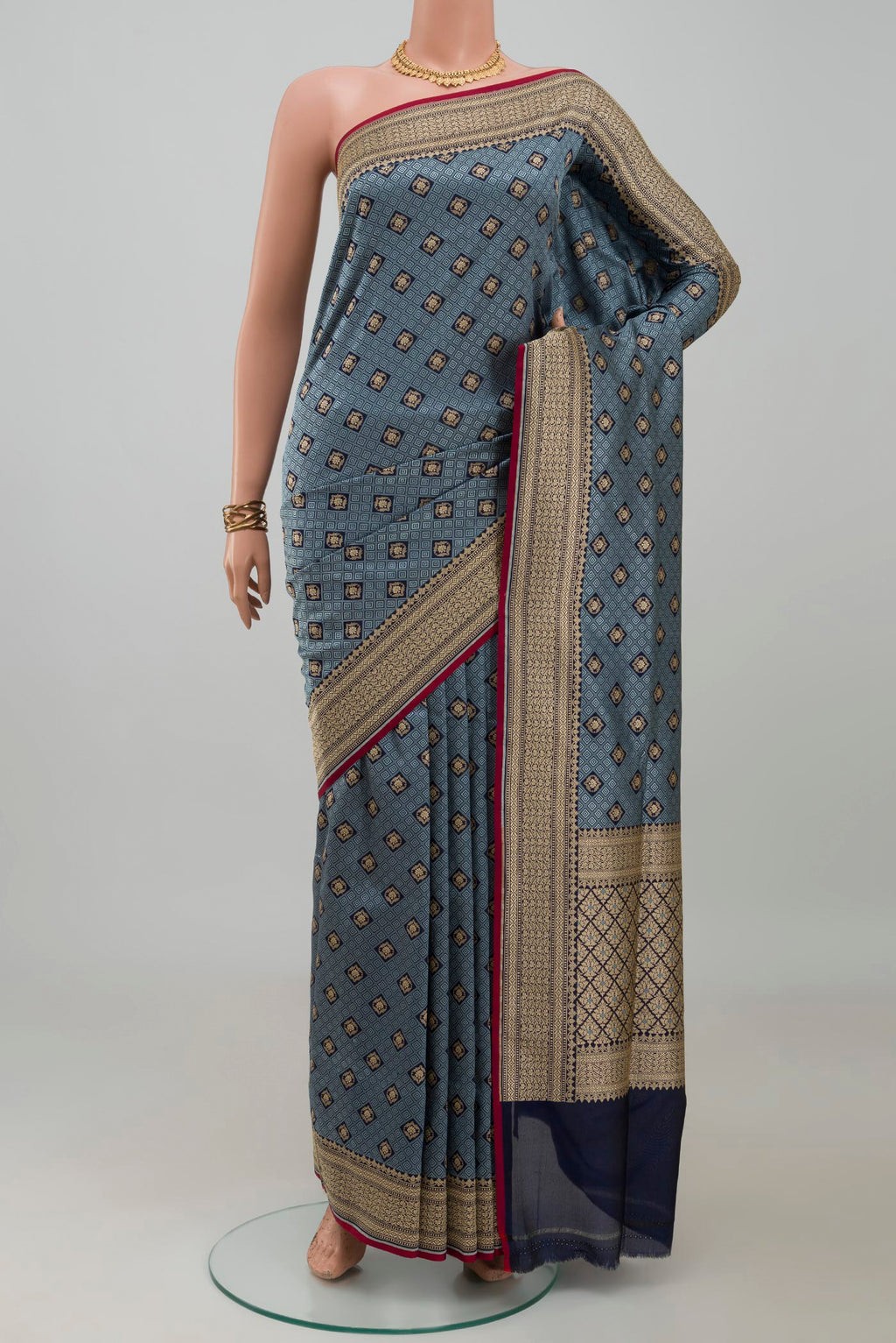 Grey Banarasi Silk Saree with Jacquard With Zari Butta on the body and Zari Border.  displayed on a mannequin